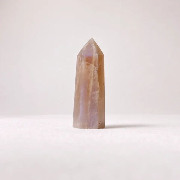 The Moonstone Mini Point embodies gentle strength, emotional restoration, and intuitive wisdom. Known for its deeply nurturing energy, moonstone supports physical vitality, spiritual growth, and emotional balance. Its focused point shape channels soothing lunar energy, helping you reconnect with inner rhythms, heal past wounds, and cultivate stability in both relationships and spirit.