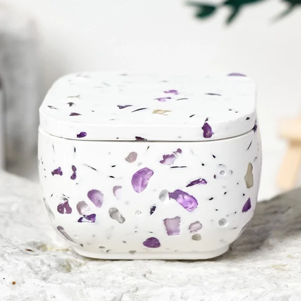A serene Amethyst Candle Holder adorned with crushed amethyst crystals and paired with an After-Rain Bamboo Grove scented soy candle. This handcrafted piece blends earthy mineral texture with fresh botanical fragrance, creating a calming, spa-like atmosphere for mindful living and elevated home décor.