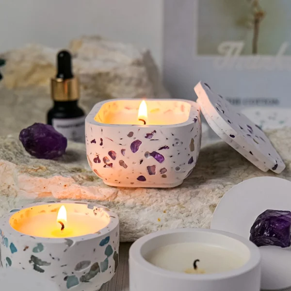 A tranquil Aquamarine Candle Holder adorned with crushed aquamarine crystals and paired with a Blue Wind Chimes scented soy candle. This handcrafted piece blends oceanic mineral tones with airy, refreshing fragrance, creating a serene coastal ambiance for relaxation, clarity, and refined home décor.