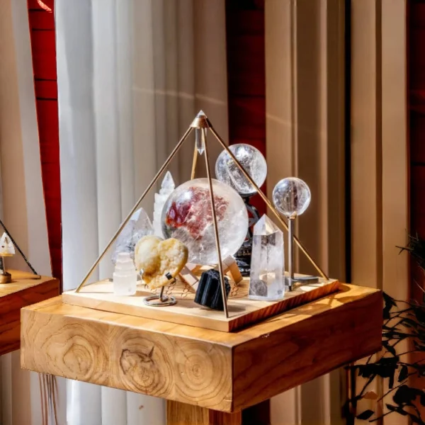 The Vogel Crystal Pyramid is a refined expression of sacred geometry, crafted with a beechwood base, pure copper support, and natural Vogel crystal. Designed as a powerful Energy Amplifier & Purifier, it channels focused intention, harmonizes space, and elevates spiritual awareness through precision and symbolism.